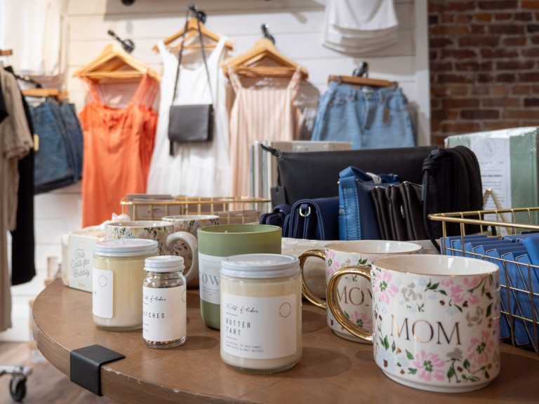 A selection of housewares and gifts, including mugs and candles
