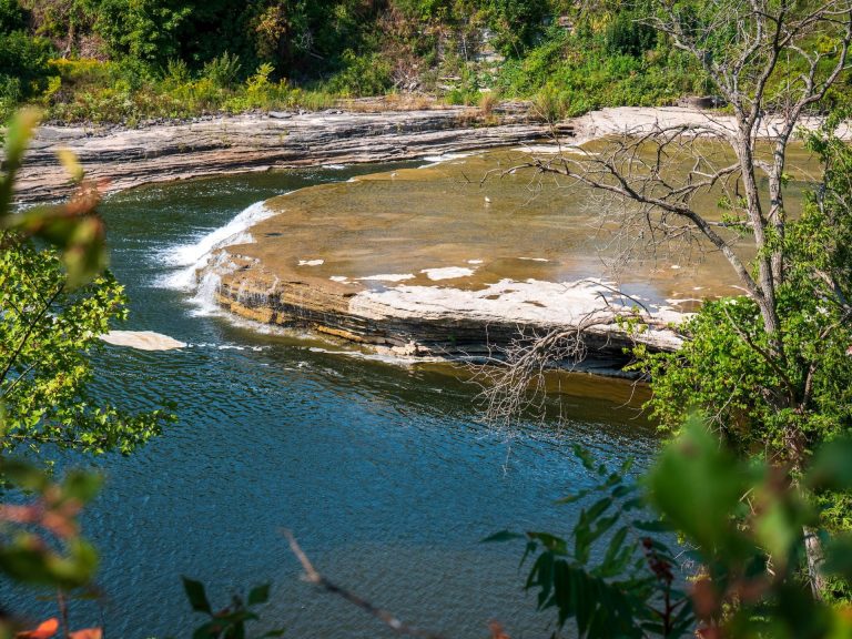 a rocky shelf creates a shallow water cascade